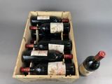 many bottles of wine in a wooden box