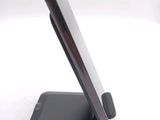 a cell phone that is sitting on top of a stand