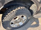 a close up of a tire on a truck