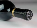 a bottle of wine that is sitting on a table
