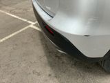 a close up of a car ' s rear bumper