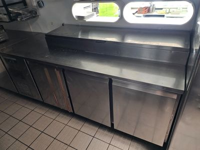a stainless steel counter in a commercial kitchen