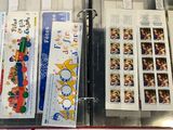a lot of stamps on display in a case