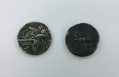 two ancient roman coins, one of which is a roman coin and the other of which is a roman coin