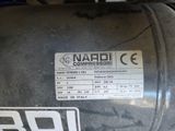 an image of a close up of a compressor with a label on it