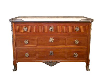 an image of a chest of drawers with a marble top
