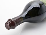 a bottle of wine that is sitting on a table