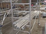 a lot of scaffolding in a building that is being built