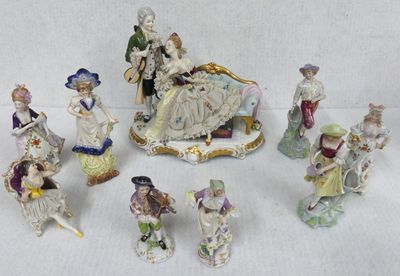 many figurines that are sitting on a table