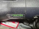 a close up of a car dashboard with a sticker on it