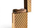 an image of a lighter that is sitting on top of a table