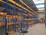 warehouse shelving racking in a large warehouse with lots of shelves