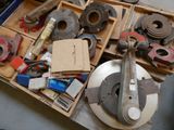 a box full of tools sitting on the floor