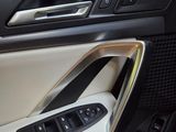 a close up of a car ' s interior with the door open