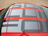 a close up of a red car with the hood up