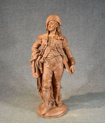 statue of a man in a military uniform holding a rifle