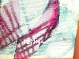 a picture of a painting of a mermaid tail on the wall