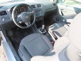 a car dashboard with a steering wheel and a dash board