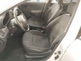 the interior of a car with black leather seats and a steering wheel