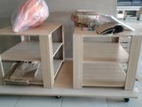 two wooden shelves with plastic bags on top of them