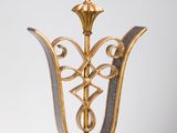 brass and marble table lamp with a black and gold shade