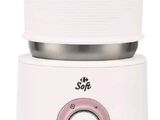 the small white blender is sitting on top of the counter
