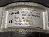 a close up of a metal object with a tag on it