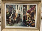 une photo d'un tableau représentant une scène de rue, dans un cadre