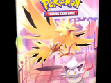 un jeu de cartes à collectionner Pokémon dans une boîte en fer-blanc