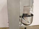 an image of a mixer on a stand in a room