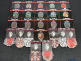 a lot of ties that are on a black table