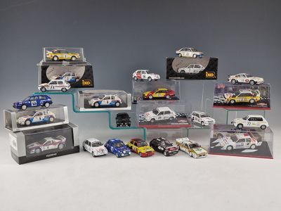 a lot of toy cars that are in a display case
