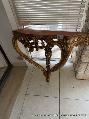 a small table with a mirror on top of it