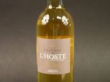 a bottle of white wine that is sitting on a table