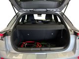 a trunk of a car with a bunch of wires in it