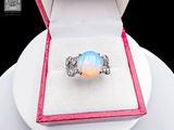a ring that is sitting in a box on a plate
