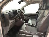 a view of the inside of a truck with the driver ' s seat up