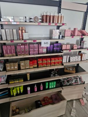 a large display of cosmetics products in a store