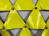 a close up view of a yellow and grey bag