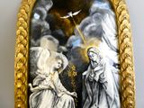 a picture of a painting of an angel and a woman