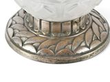 a white bowl of food on top of a silver plate
