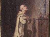 an old painting of a man kneeling in front of a table