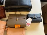 a lot of purses on a table with a price tag