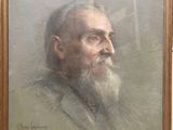 portrait of a man with a beard in a gold frame