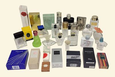 many different types of perfumes on the table