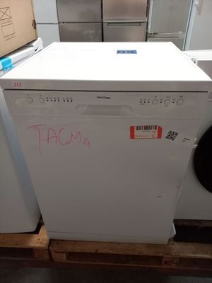 a white dishwasher sitting on a pallet in a kitchen