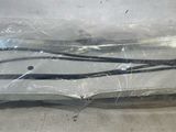 a pair of windshield wipes in a plastic bag