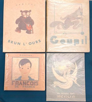 four children ' s books are sitting on a blue cloth