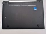 a black laptop with a blue sticker on it