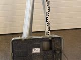 a tool case with tools inside of it on the floor